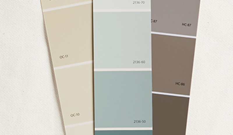 Three Benjamin Moore Display Chips on a painter's dropcloth.