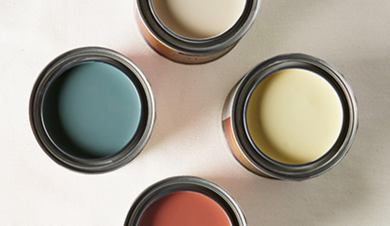 Four pint-sized Paint Color Samples with tops off showcasing a range of paint colors inside.