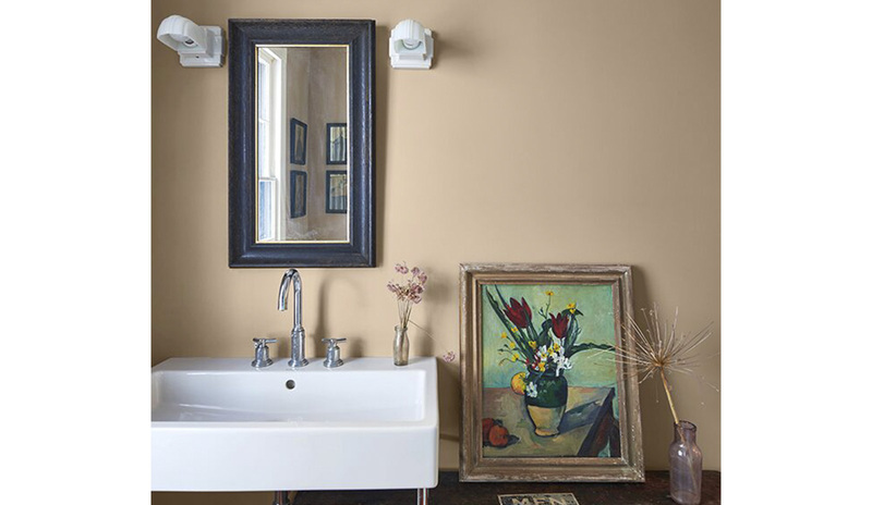 Un baño inspirado en la naturaleza con paredes pintadas en color Crema Soda 1082
